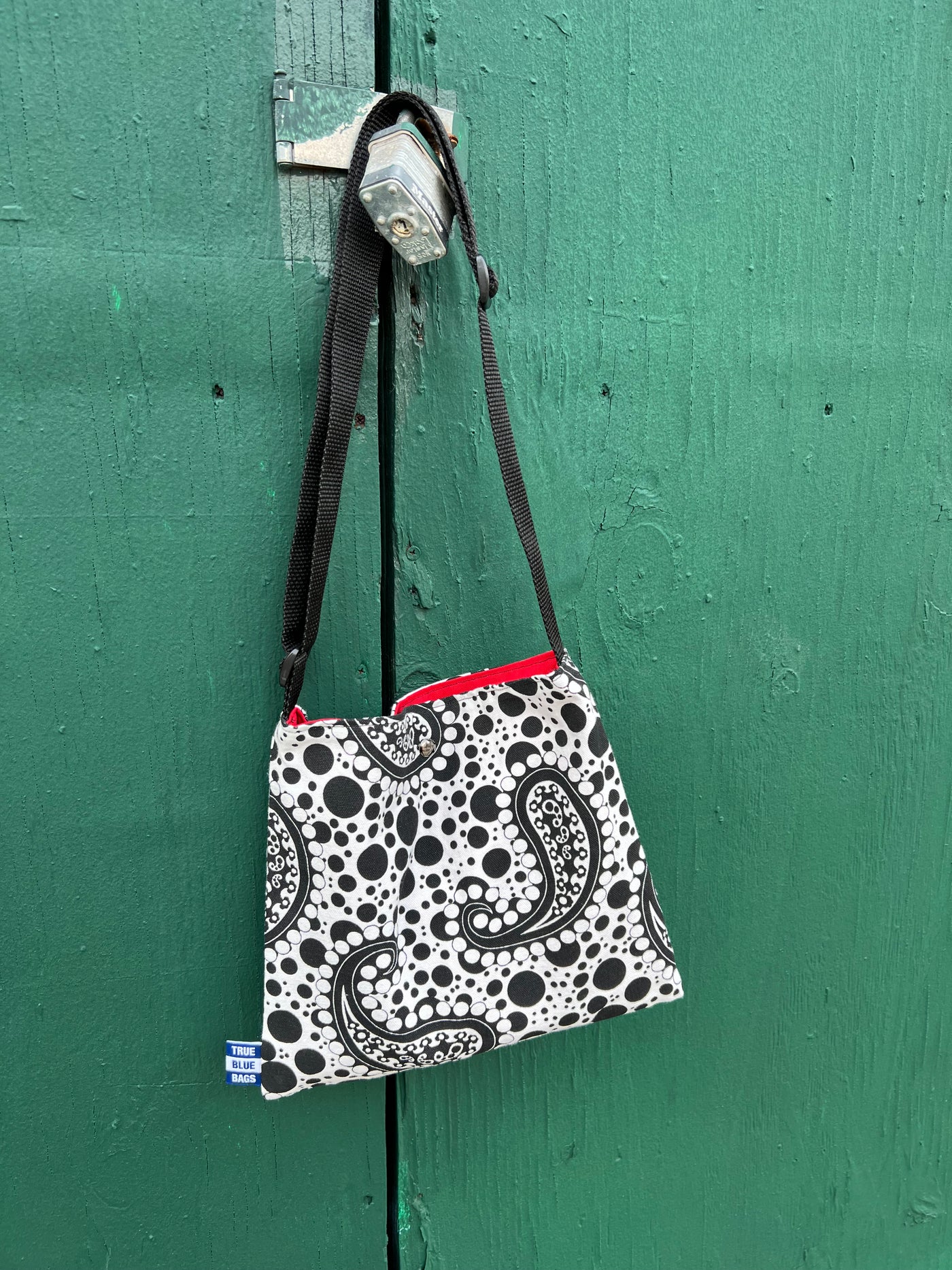 BLACK PAISLEY BAG WITH RED CHERRY LINING